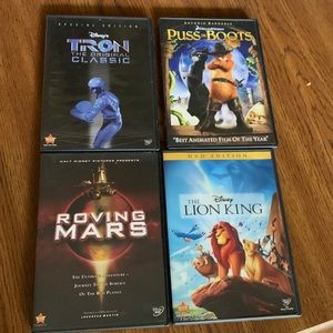 Disney DVD Bundle- Lion King, TRON, Puss in Boots, Roving Mars